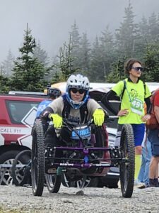 Carol Brunjes was the first adaptive rider cross the finish line.