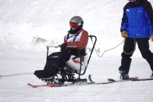 Athlete piloting the Snowkart