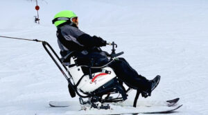 Skier controlling the TetraSki with a Joystick