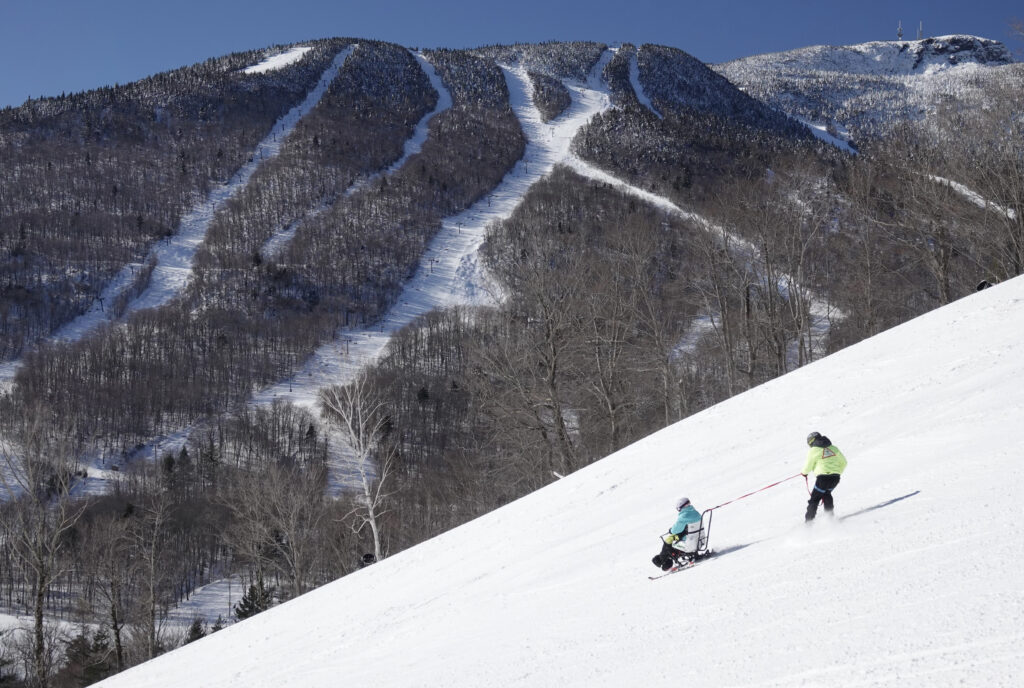 Dave Neubardt with an athlete