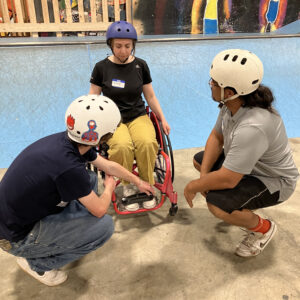 Amy testing a wheelchair.