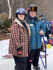A SNAP instructor with a Special Olympics athlete.