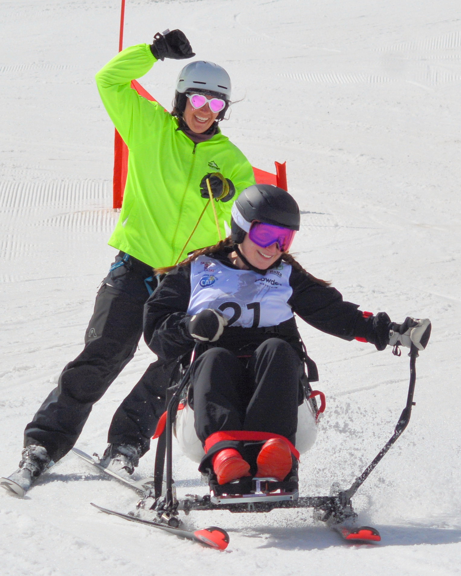 Allie and Nechie having a blast skiing the Snow'Kart