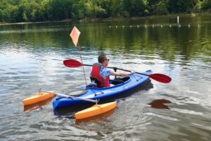 Adaptive Kayaking is made possible with outriggers.