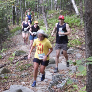 Runners climbing the trails at Trapps.