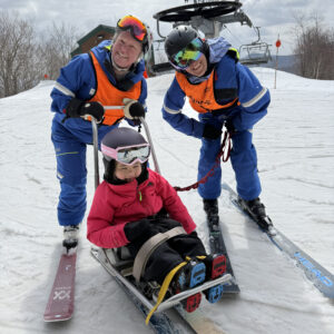 Weezie and Tracy skiing with Vivi.