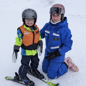 Instructor Sydney and her young skier.